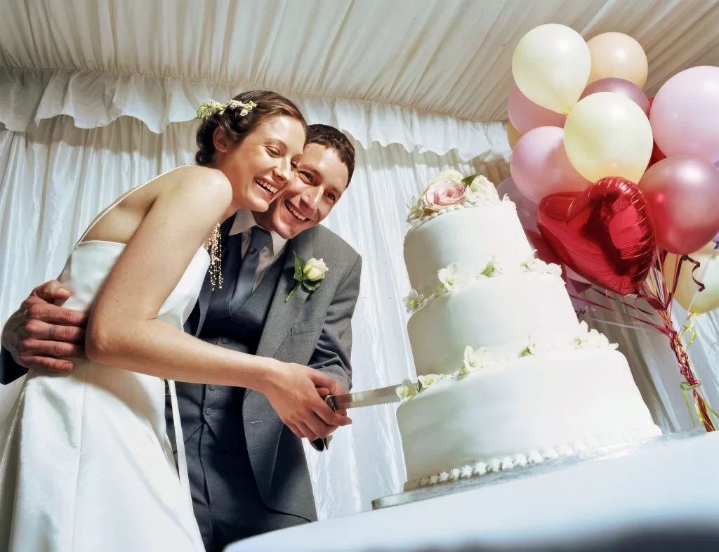 Wedding highlight films bride cut cake 1