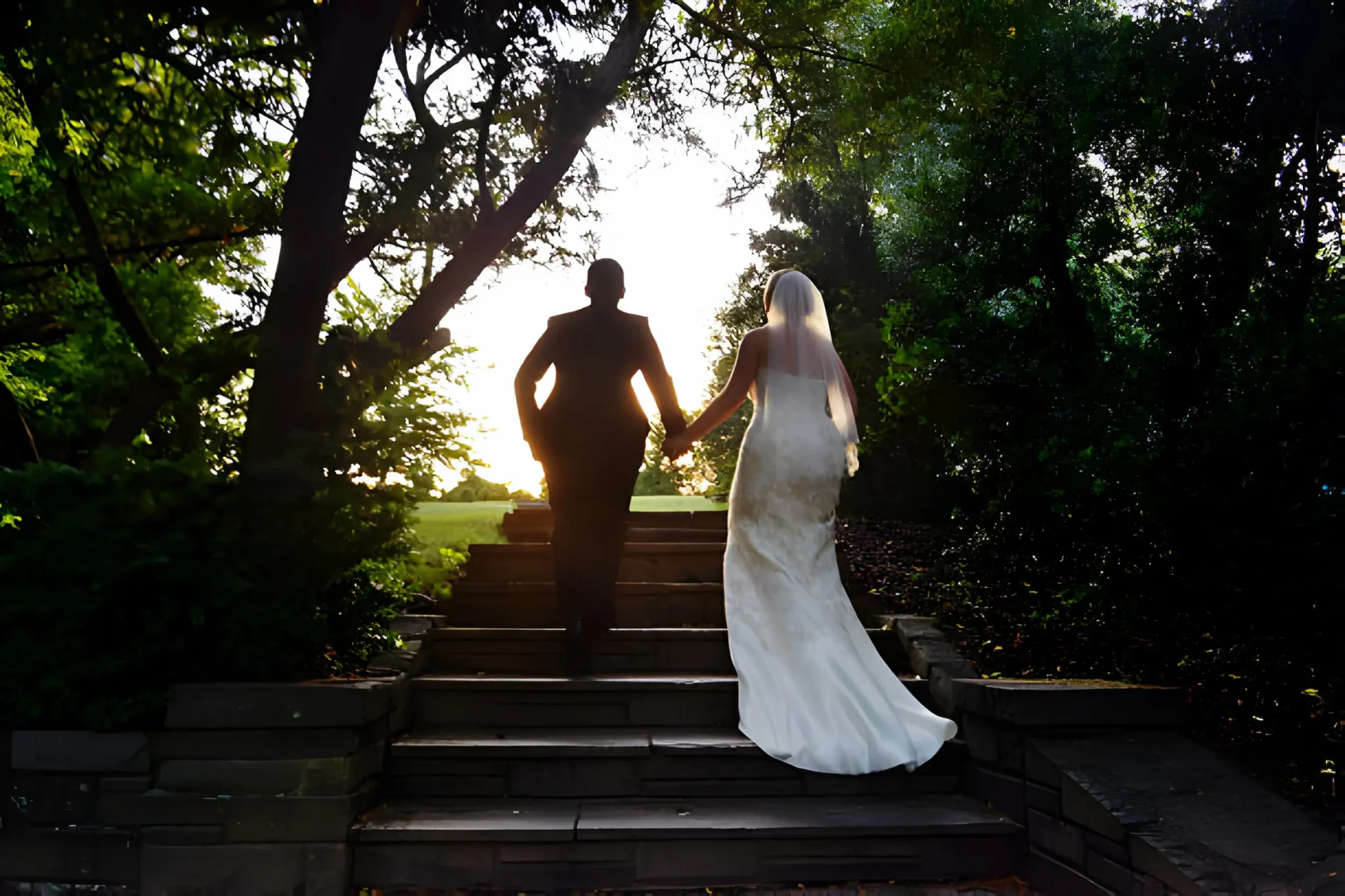 Wedding Photographer Photography Couple Walking Up Steps Into The Sunshine
